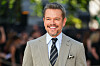 Matt Damon lächelt in hellem Anzug bei der Premiere von «The Odyssey» am Leicester Square.