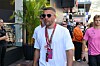 Lukas Podolski mit Sonnenbrille und Akkreditierung in Monte Carlo beim Monaco Grand Prix.