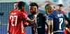 David Alaba (l./Bayern) mit Neymar und Kylian Mbappe (PSG) beim Champions-League-Finale.