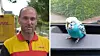 DHL-Mitarbeiter links, blauer Wellensittich rechts auf dem Armaturenbrett vor der Windschutzscheibe.