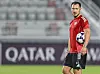 Matthias Jaissle im roten Trainingstrikot auf dem Platz in Doha vor einer AFC-Champions-League-Partie.