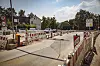 Baustelle an der Wellingsbüttler Landstraße/Fuhlsbüttler Straße mit Absperrungen und Auto