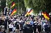 Demo der AfD-Jugend Generation Deutschland mit Deutschlandflaggen in der Schweriner Innenstadt.