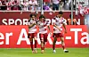 Anas Slimani, Kilian Sauck und Jordi Paulina jubeln nach dem 2:1 für Fortuna Düsseldorf gegen Borussia Dortmund.