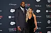 LeBron James und Savannah James vor einer Time100-Sports-Logowand in New York.