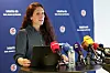 Lise Klaveness bei NFF-Pressekonferenz in Oslo vor Mikrofonen und Laptop.