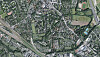Luftaufnahme eines Stadtgebiets mit Wohnvierteln, Bahntrassen, Straßen und Grünflächen in Hamburg.