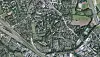 Luftaufnahme eines Stadtgebiets mit Wohnvierteln, Bahntrassen, Straßen und Grünflächen in Hamburg.