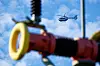 Polizeihubschrauber kreist über dem Umspannwerk von Amprion in Bergheim bei Köln.