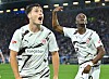 Arkadiusz Pyrka und Abdoulie Ceesay bejubeln ein St. Pauli-Tor in Bielefeld.