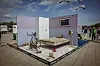 Die Installation hatte Küche, Wohnzimmer, Schlafzimmer und ein Jugendzimmer.