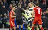 Joshua Kimmich und Ilkay Gündogan rangeln im Spiel
