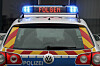 Ein Polizeiauto mit der Aufrischft 'Folgen' (Symbolfoto)