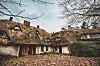 Verfallenes Reetdach-Haus