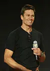 Tom Brady lächelnd bei einer Veranstaltung
