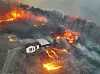 Durch starke Winde angefacht: Häuser brennen in einem Dorf im Südosten Südkoreas, nachdem sie von einem Waldbrand verschlungen wurden.