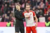 Manuel Neuer und Harry Kane klatschen sich ab.