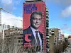 Nicht einmal 200 Meter entfernt vom Estadio Santiago Bernabeu wirbt Joan Laporta mit einem Wahlplakat für Kandidatur als Präsident des Erzrivalen FC Barcelona.