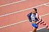 Sprint-Star Allyson Felix mit der Flagge der USA um die Schultern