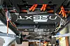 In der „Naext”-Werkstatt wird noch am zweiten Prototypen getüftelt. Die Akku-Module sind unten am Auto.
