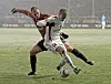 Rouwen Hennings im Zweikampf mit André Schürrle