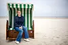 Nadine Weber sitzt in einem grünen Strandkorb