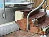 Die Treppe auf der Dachterrasse des David Lloyd Meridian Alstertal. Sie führt zum Whirlpool und ist ziemlich stark beschädigt