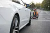 Ein Aktivist der „Letzten Generation“ bei einer Straßenblockade