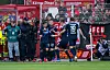 Spieler des 1. FC Heidenheims jubeln nach einem Treffer ihre Teams.