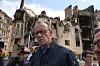 Der CDU-Vorsitzender Friedrich Merz macht sich ein Bild von der Zerstörung in Irpin.