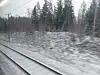Die schwedische Landschaft während der Zugfahrt – dort liegt noch jede Menge Schnee.