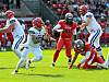Sea-Devils-Quarterback Haire rennt von Köln-Verteidigern weg