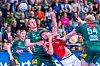 Jacob Lassen wirft unter Bedrängnis.