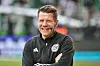 Hamburger DFB-Schiedsrichter Patrick Ittrich verschränkt die Arme und lacht